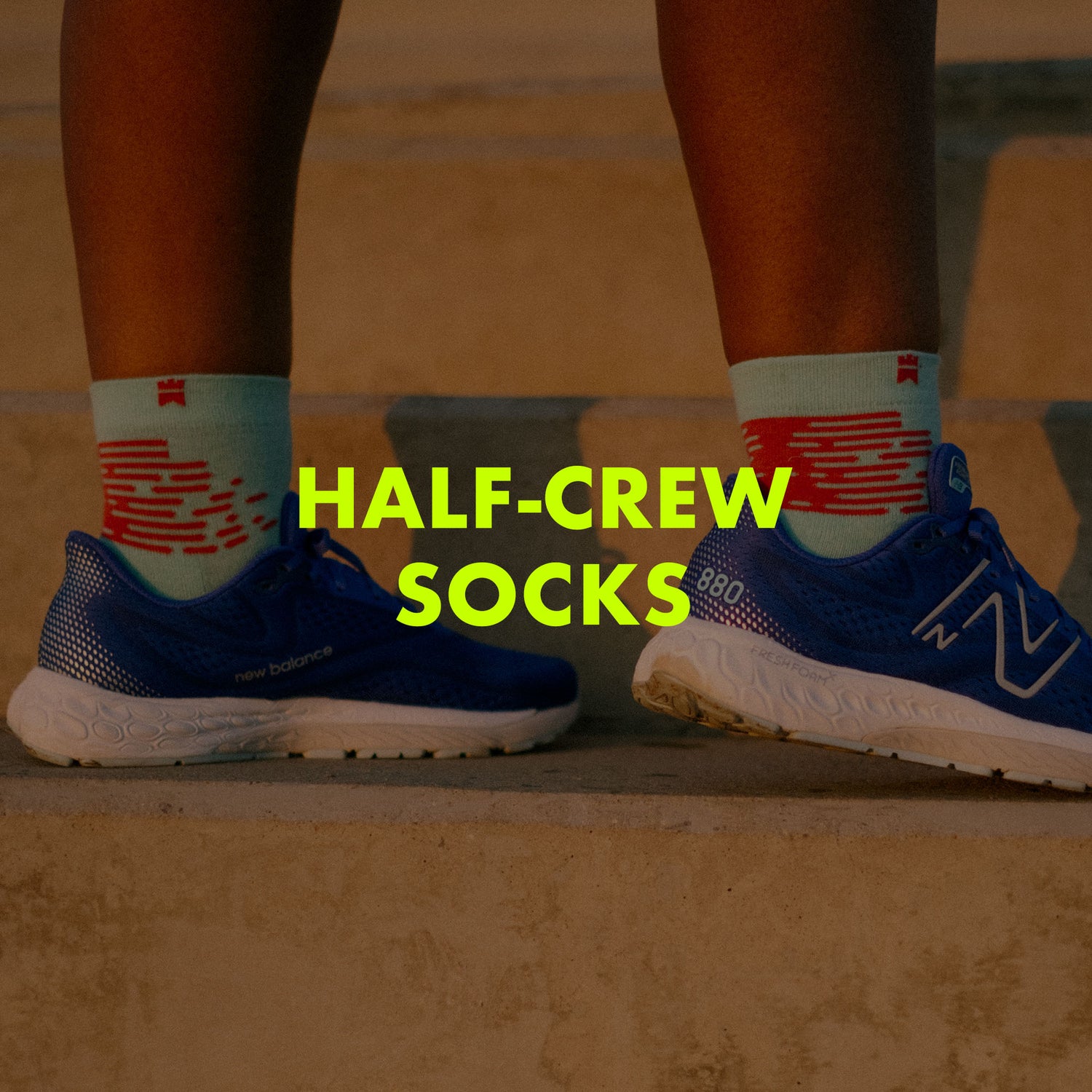 Photograph of an athlete wearing half-crew height socks with text overlay saying "Half-Crew Socks".